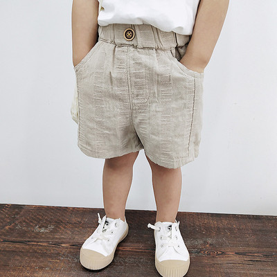 Pantaloni scurți pentru băieți în alb și bej