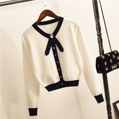 Vestă elegantă de damă cu decolteu în V în alb-negru