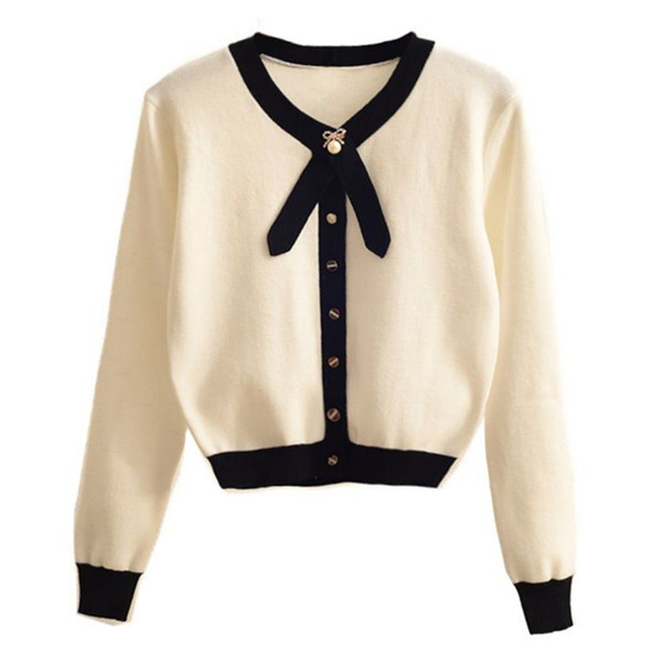 Vestă elegantă de damă cu decolteu în V în alb-negru