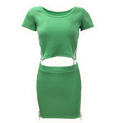 Modern női szett zöld és fekete cipzáras pólóval és szoknyával