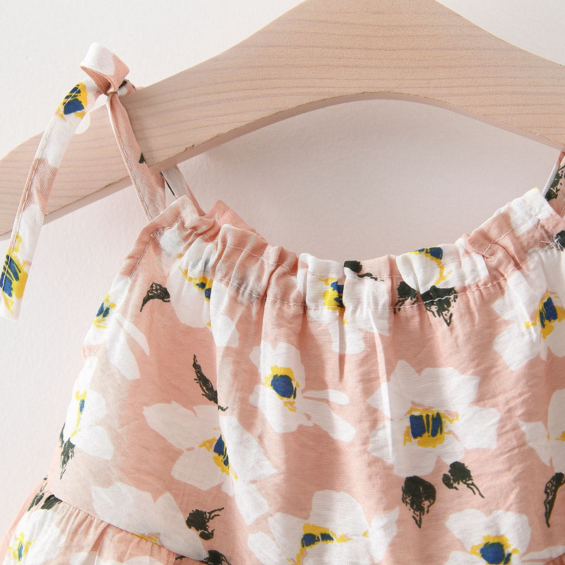 Rochie decupata pentru bebelusi cu motive florale in trei culori