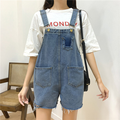 Salopetă de damă modernă din denim cu buzunare în albastru