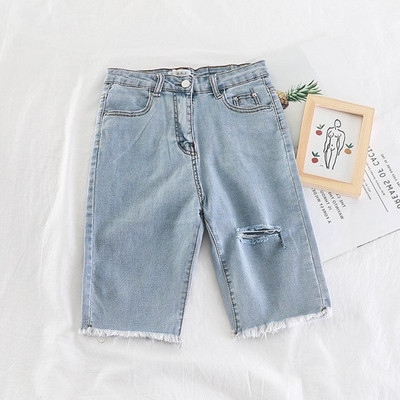 Blugi de dama model nou 3/4 cu motive rupte in albastru