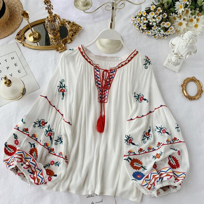 Női modern blúz széles ujjal és több színben hímzéssel