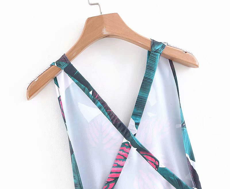 Modern teljes fürdőruha virágmintával és keresztpántokkal