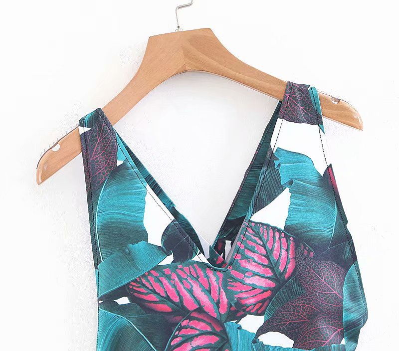 Modern teljes fürdőruha virágmintával és keresztpántokkal