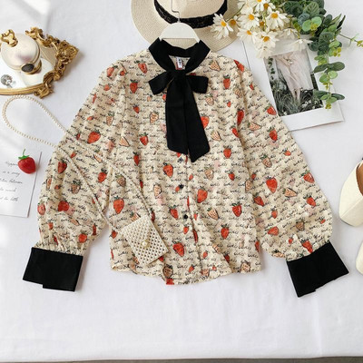 Modern női ing szalaggal és színes mintával