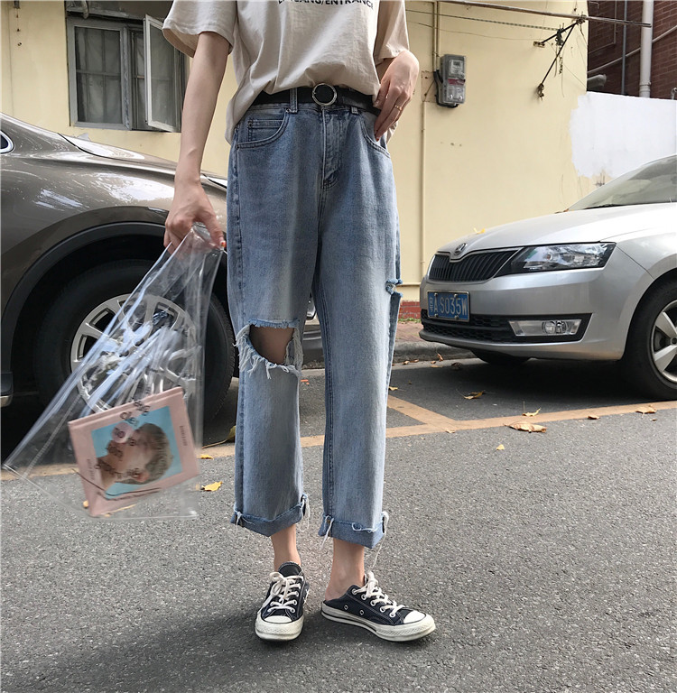 Blugi moderni de dama cu motive rupte in albastru