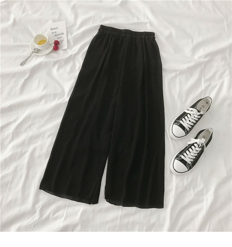 Női széles modellnadrág fehér és fekete színben