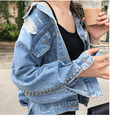 Μοντέρνο γυναικείο μπουφάν με μεταλλικά στοιχεία και μεγέθη μέχρι 5XL