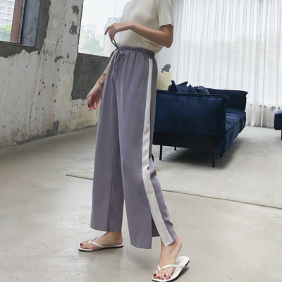 Спортен дамски панталон с еластична талия и бял кант в два цвята