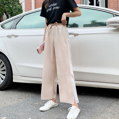 Спортен дамски панталон с еластична талия и бял кант в два цвята