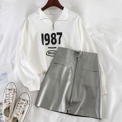 Set casual de dama care include bluza si fusta din piele