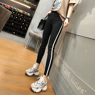 Pantaloni casual de damă în negru cu margini