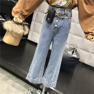 Női farmer széles modell gombokkal és fém elemekkel