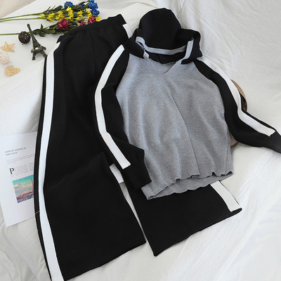 Női sportszett, mely tartalmaz egy kapucnis pulóvert és széles nadrágot három színben