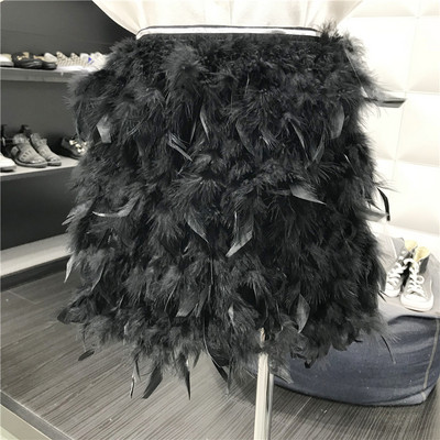 Νέο μοντέλο μοντέρνα γυναικεία φούστα με φτερά σε μαύρο και άσπρο