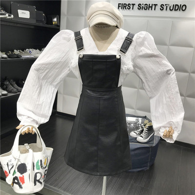 Модерен дамски сукман от еко кожа в черен и кафяв цвят