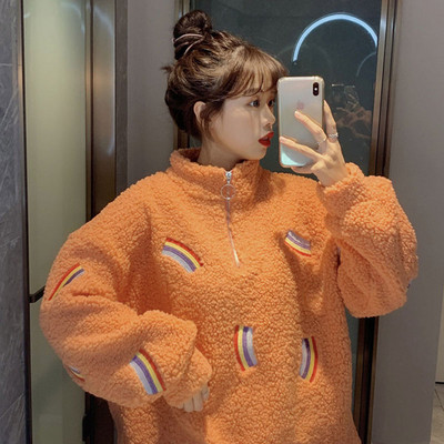 Narancssárga színű puha női pulóver, széles cipzáras modellel