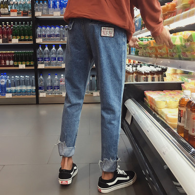 Τα casual τζιν ανδρικά με εκτύπωση πίσω