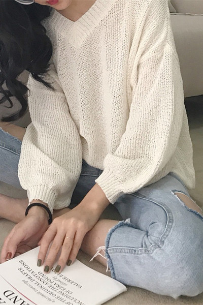 Γυναικεία πουλόβερ με λεπτή πλέξη και V-neckline