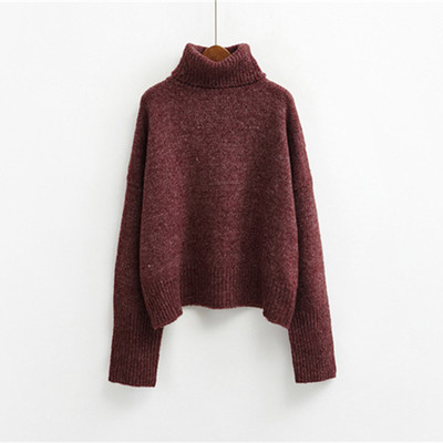 Топъл дамски пуловер в широк модел с поло яка
