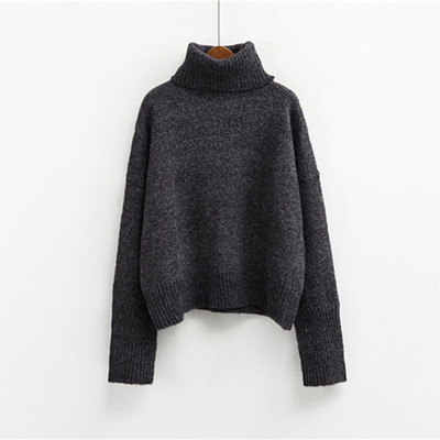 Топъл дамски пуловер в широк модел с поло яка