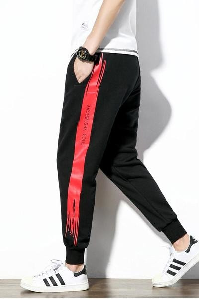 Άνετα παντελόνια ανδρικών φθινοπώρου - 2 μοντέλα με λευκές και κόκκινες κορδέλες