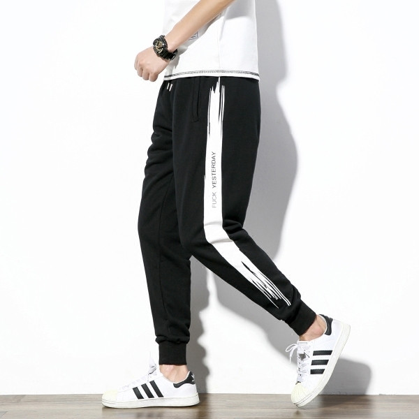 Άνετα παντελόνια ανδρικών φθινοπώρου - 2 μοντέλα με λευκές και κόκκινες κορδέλες