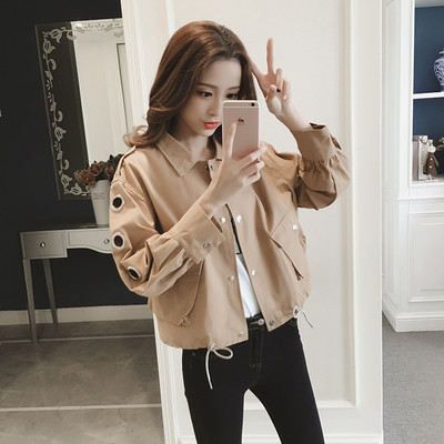 Κομψό σακάκι για κυρίες με μεταλλικά δαχτυλίδια στα μανίκια σε δύο χρώματα