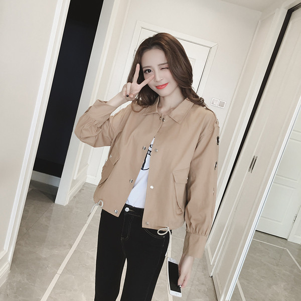 Κομψό σακάκι για κυρίες με μεταλλικά δαχτυλίδια στα μανίκια σε δύο χρώματα