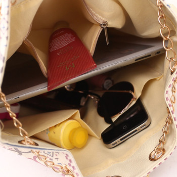 Πρακτική τσάντα σε σχήμα σακιδίου με μακρύ και κοντό χερούλι
