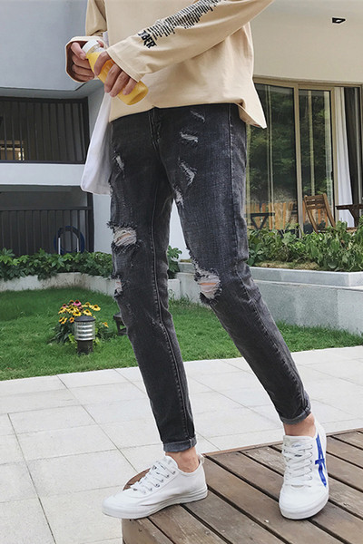 Κομψά τζιν ανδρικά σε μπάλες HIT μοτίβο σε σκούρο χρώμα