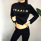 Φούστα γυναικείας φθινοπώρου-χειμώνα σε μαύρο χρώμα με επιγραφή και κολάρο για πόλο