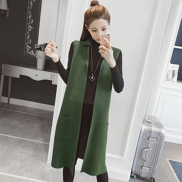 Κομψό μακρύ γιλέκο για κυρίες σε απλό μοντέλο σε τρία χρώματα