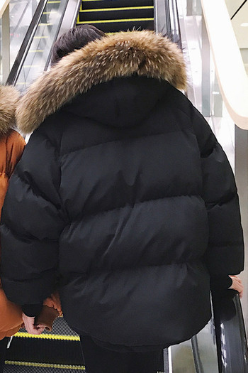 Дебело зимно яке с качулка с пух в черен и оранжев цвят - унисекс