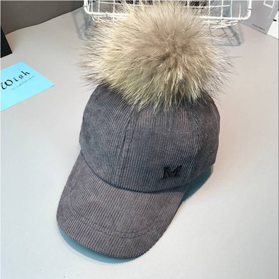 Стилна детска шапка с козирка и пухче в много цветове