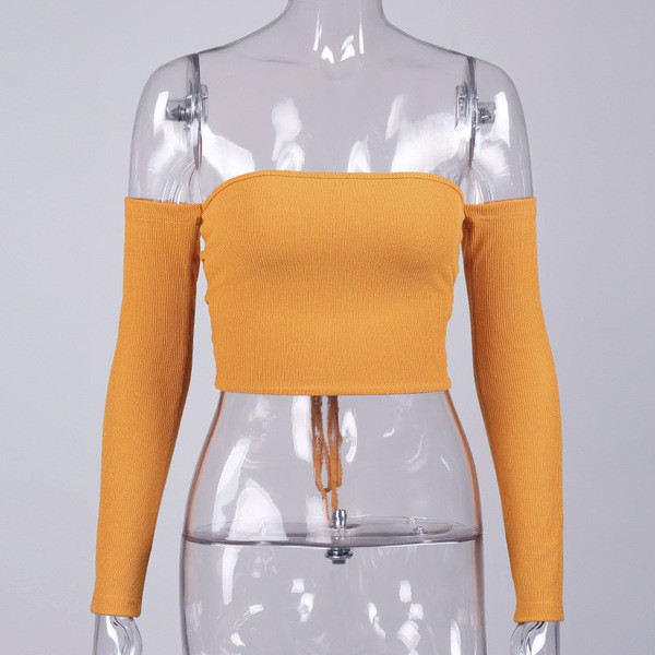 Модерна дамска блуза в слим модел с паднали рамене и връзки на гърба в жълт цвят