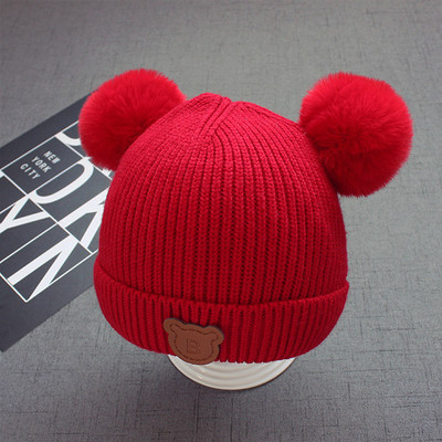 Зимна детска шапка в много цветове и пухчета