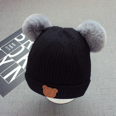 Зимна детска шапка в много цветове и пухчета