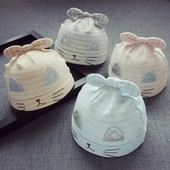 Бебешка шапка в няколко разцветки с панделка