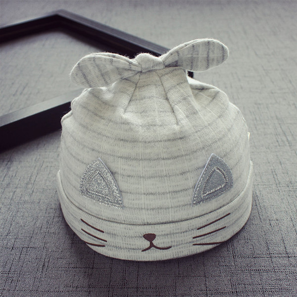 Бебешка шапка в няколко разцветки с панделка