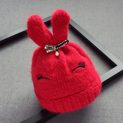 Вълнена детска шапка за момичета с ушички и панделка