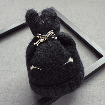 Вълнена детска шапка за момичета с ушички и панделка