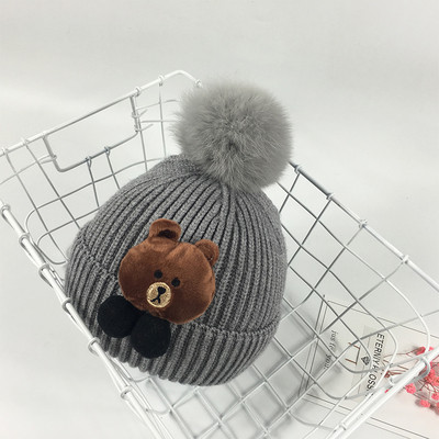 Топла бебешка шапка с пух и  3D декорация мече в пет цвята