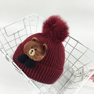 Топла бебешка шапка с пух и  3D декорация мече в пет цвята