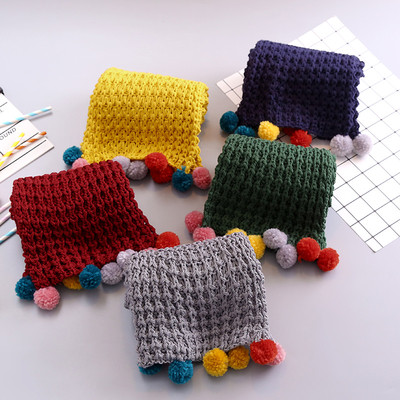 Стилен плетен детски шал в различни цветове и с цветни пухчета