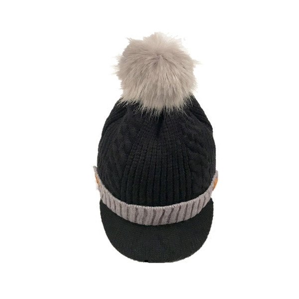 Зимна детска шапка с козирка и пухче в няколко цвята