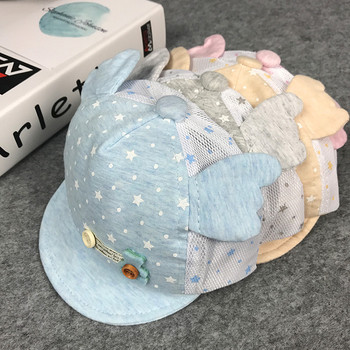 Бебешка шапка с козирка и декорация в четири цвята
