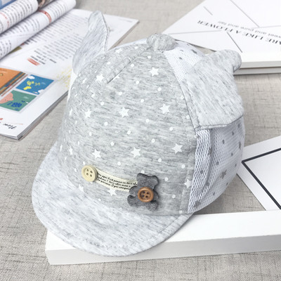 Бебешка шапка с козирка и декорация в четири цвята